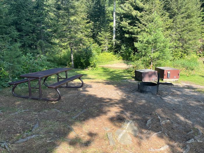 K7 View looking into campsite core area of the picnic table fire ring bear lockers and tent pad in the background.