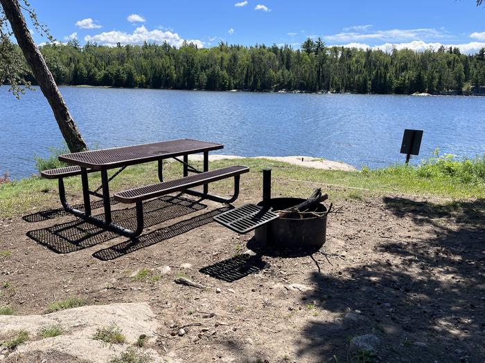 K16 Lost Bay view looking out from campsite core of the picnic table and fire ring.