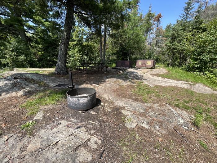 K24 View looking into campsite core of the fire ring picnic table bear lockers and a tent pad.